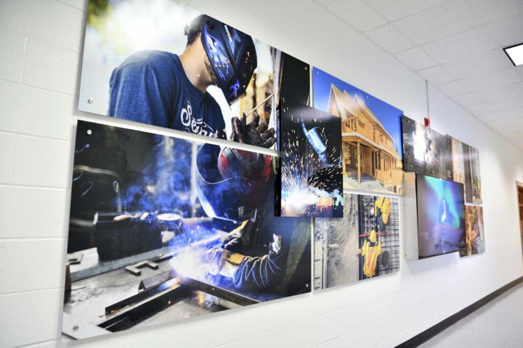 Collage Wall with Panel Signage on Standoffs and Television for Digital Signage